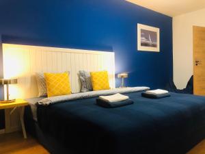 A bed or beds in a room at Villa La Via ***