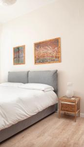 Een bed of bedden in een kamer bij Carbonia 96 - Appartamento Boutique