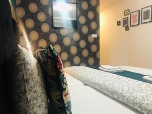 A bed or beds in a room at Villa La Via ***