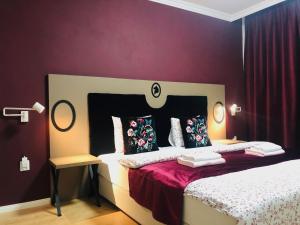A bed or beds in a room at Villa La Via ***