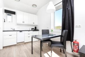 Kuchyň nebo kuchyňský kout v ubytování Hvammból Guesthouse