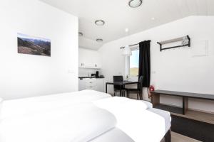 Postel nebo postele na pokoji v ubytování Hvammból Guesthouse