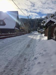 Obiekt Winterfell Korbielów - dom z basenem sezonowym lipiec-sierpień zimą