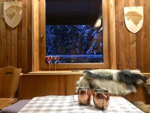 Łóżko lub łóżka w pokoju w obiekcie Winterfell Korbielów - dom z basenem sezonowym lipiec-sierpień