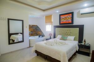 Voodi või voodid majutusasutuse Hotel Presidente Beach Salinas toas