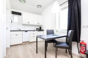 Kuchyň nebo kuchyňský kout v ubytování Hvammból Guesthouse