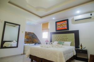 Voodi või voodid majutusasutuse Hotel Presidente Beach Salinas toas