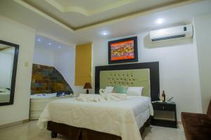 Voodi või voodid majutusasutuse Hotel Presidente Beach Salinas toas
