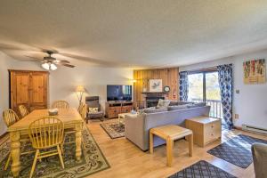 a living room with a couch and a table at Primely Located Dover Escape Less Than 1 Mi to Mt Snow! in Dover