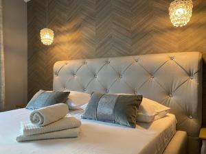 Postel nebo postele na pokoji v ubytování Willa Onyks Apartamenty