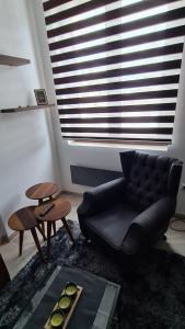 Uma área de estar em Zlatar Apartman br 16