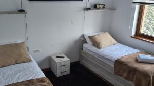 Uma cama ou camas num quarto em Zlatar Apartman br 16