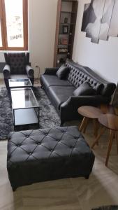 Uma área de estar em Zlatar Apartman br 16