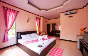 Postel nebo postele na pokoji v ubytování Seabreeze Hotel Kohchang
