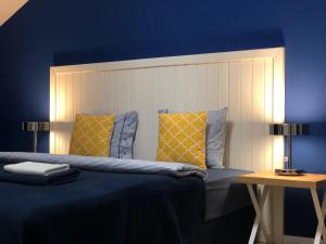 A bed or beds in a room at Villa La Via ***