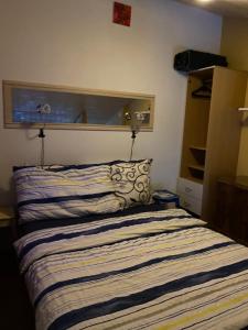 Letto o letti in una camera di Dorner Rustic Chalet