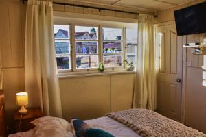 Postel nebo postele na pokoji v ubytování Hostal Triwe