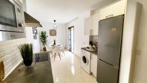 A kitchen or kitchenette at Villa Magma