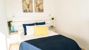 A bed or beds in a room at Villa Magma