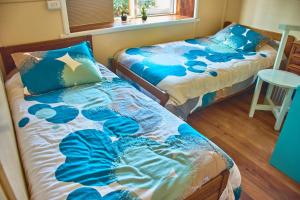 Postel nebo postele na pokoji v ubytování Hostal Triwe