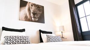 A bed or beds in a room at Villa Magma