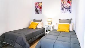 A bed or beds in a room at Villa Magma