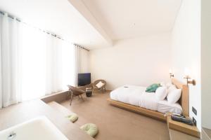 Hotel Museo Cheongju客房内的一张或多张床位