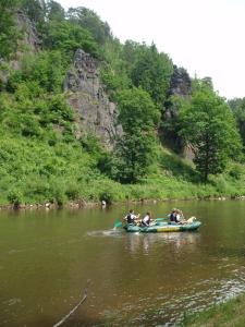 a group of people in a raft on a river at Apartment Karlovy Vary in Karlovy Vary