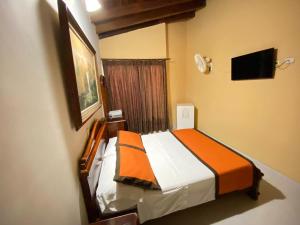 Letto o letti in una camera di Hotel Tequendama