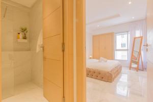 Stayhere Rabat - Agdal 2 - Classic Residence客房内的一张或多张床位
