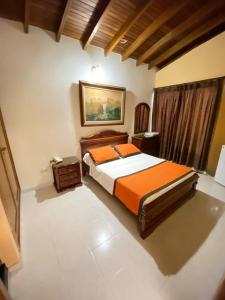 Letto o letti in una camera di Hotel Tequendama