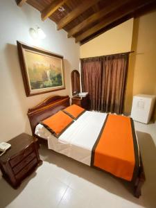 Letto o letti in una camera di Hotel Tequendama