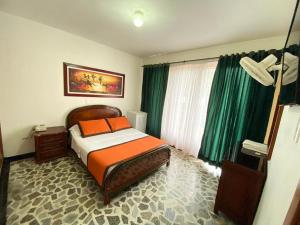 Letto o letti in una camera di Hotel Tequendama