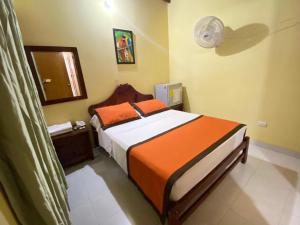 Letto o letti in una camera di Hotel Tequendama