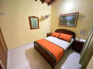 Letto o letti in una camera di Hotel Tequendama