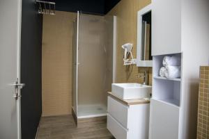 Koupelna v ubytování Hotel Guzy