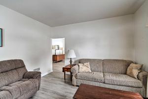 
a living room filled with furniture and a couch at Authentic Wausau Abode - half Mile to Downtown! in Wausau
