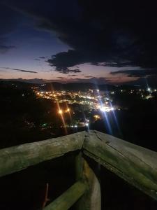 a view of a city at night with lights at Bella Vista Eco Experience in Búzios