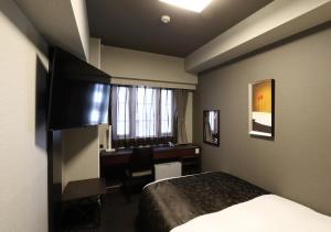 TV a/nebo společenská místnost v ubytování APA Hotel Chibachuo Ekimae + 23 fotografií