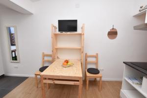 TV a/nebo společenská místnost v ubytování Apartments Nina