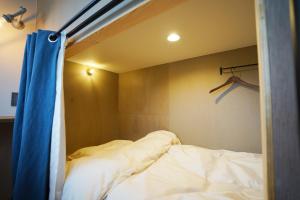 A bed or beds in a room at ta bi to〈旅人〉