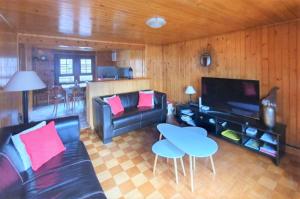 O zonă de relaxare la Appartement "Le Ver Luisant" à Saint-Martin, Val d'Hérens, Valais