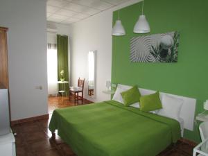 A bed or beds in a room at El Manantial Még 22 kép