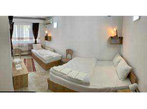 Postel nebo postele na pokoji v ubytování Hostel JAZ