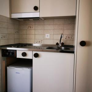 Kuchyň nebo kuchyňský kout v ubytování FeWo Fernsicht Crystal