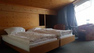 Postel nebo postele na pokoji v ubytování FeWo Fernsicht Crystal
