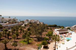 an aerial view of a resort and the ocean at Apartamentos Babalu in Puerto Rico de Gran Canaria