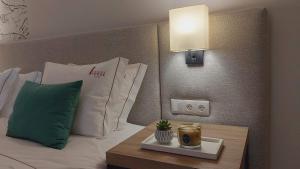 Cama ou camas em um quarto em Casa da Torre - Viseu