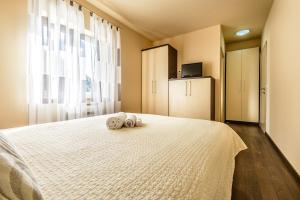 Posteľ alebo postele v izbe v ubytovaní Villa Pave
