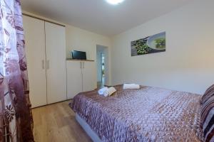 Posteľ alebo postele v izbe v ubytovaní Villa Pave